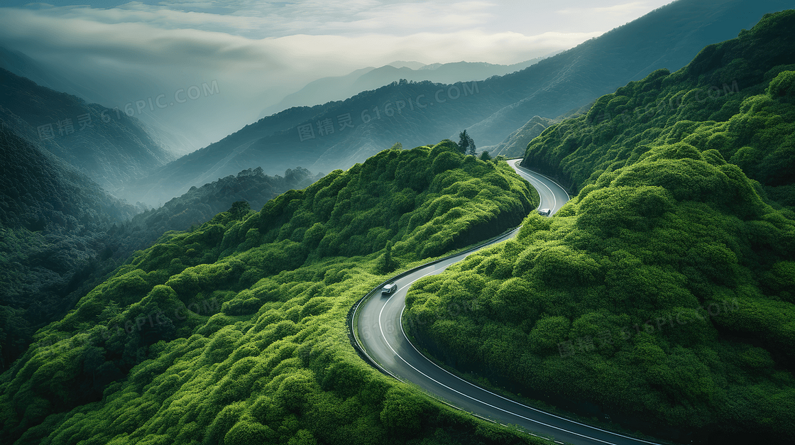 绿色山谷盘旋的公路俯视图片