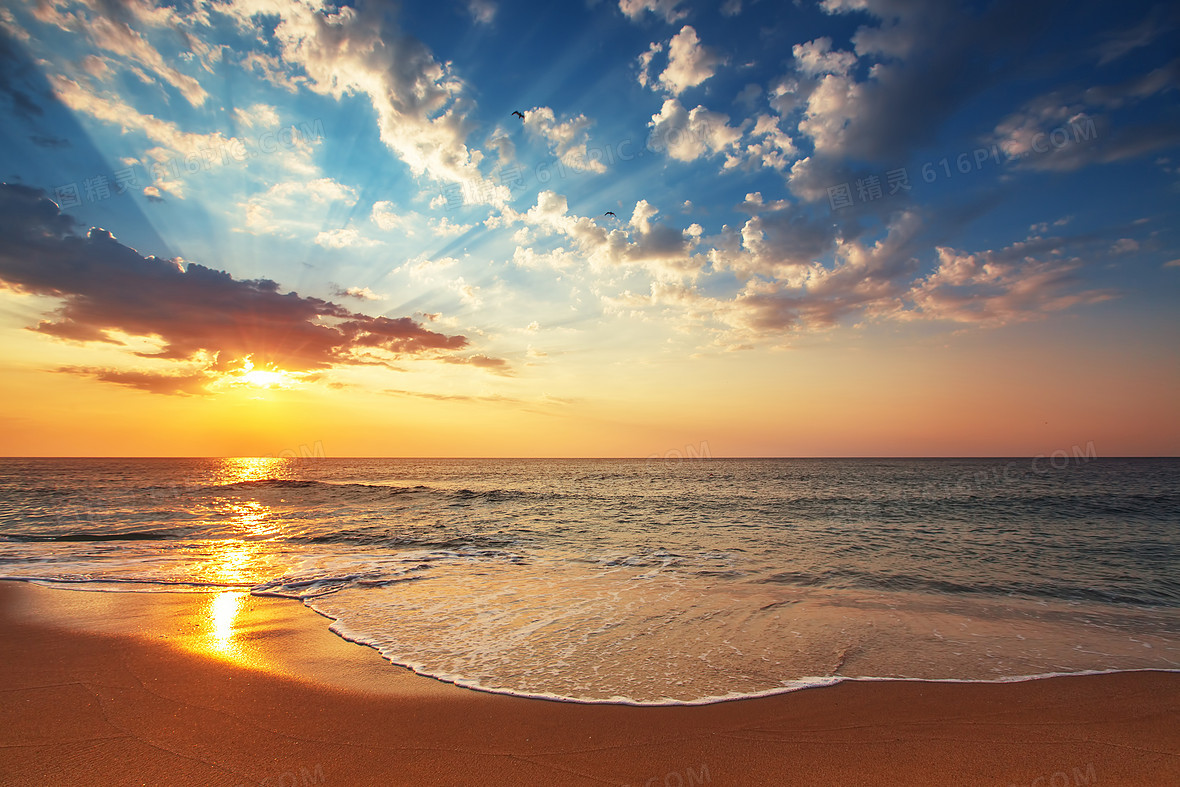 沙滩海洋夕阳落日阳光照射海浪天空摄影风景 图精灵为您提供海边