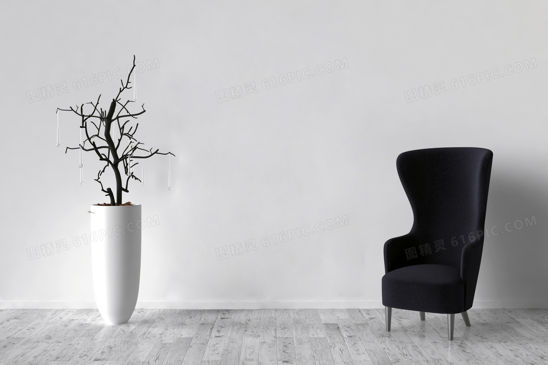 干枝装饰与黑色的高背沙发高清图片