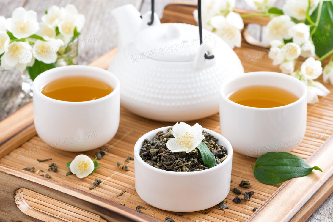 茶叶与沏好的花茶微距摄影高清图片