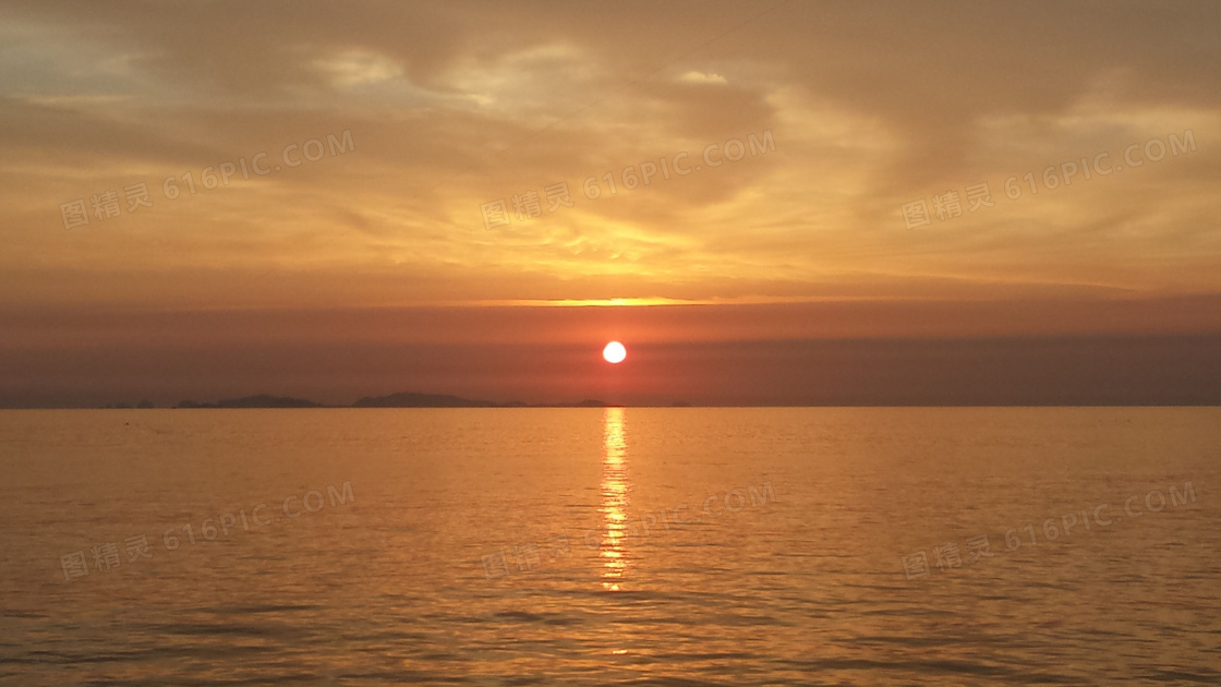 海平面上美丽日落摄影图片