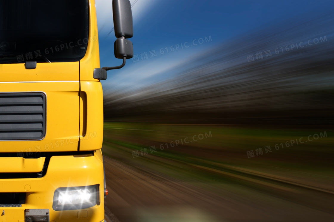 黄色大型卡车特写动感摄影高清图片