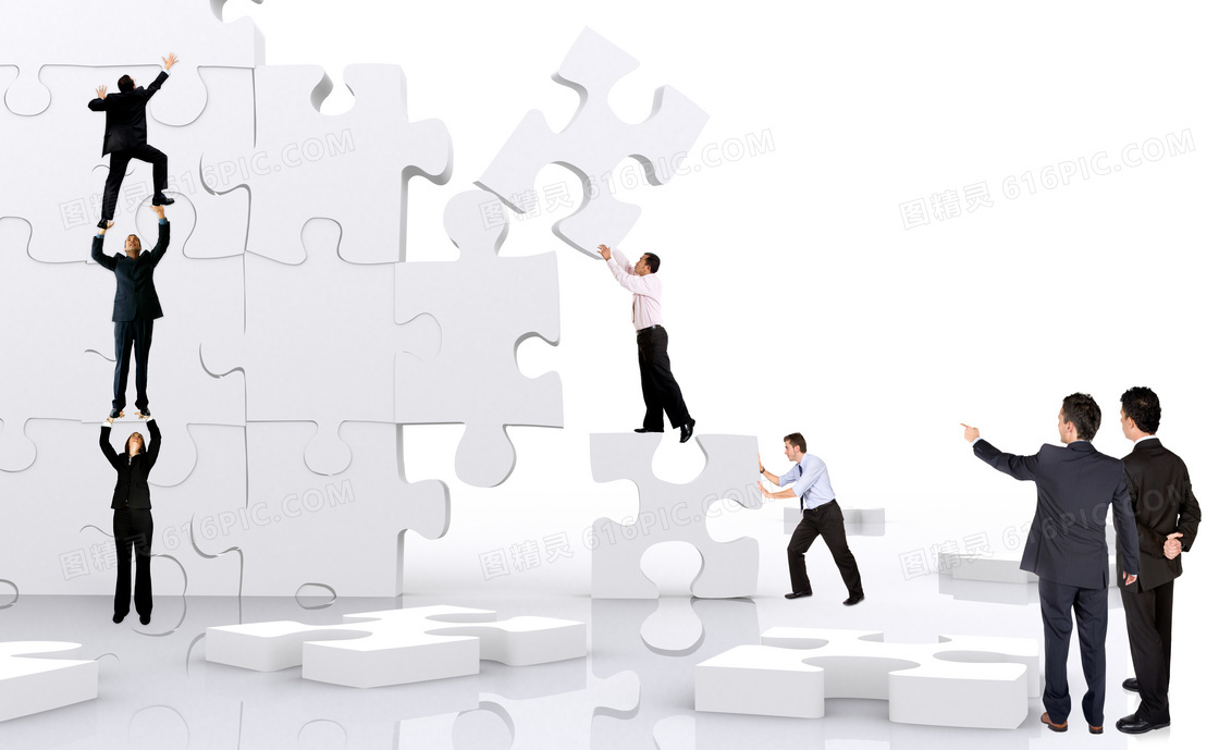 搭建拼图块墙体的职场人物高清图片