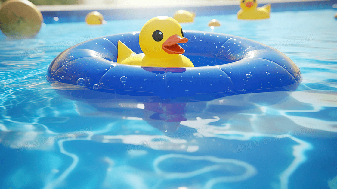 夏日游泳池上的小黄鸭游泳圈特写图片