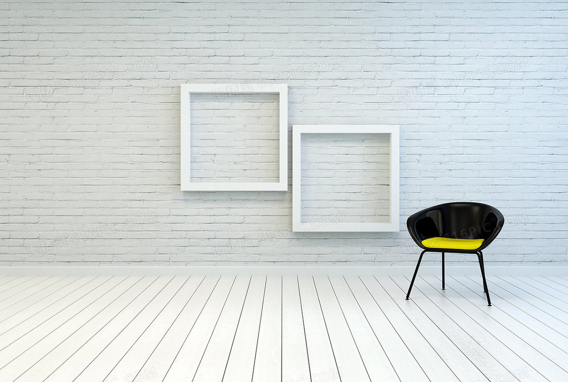 椅子与墙上的空白画框