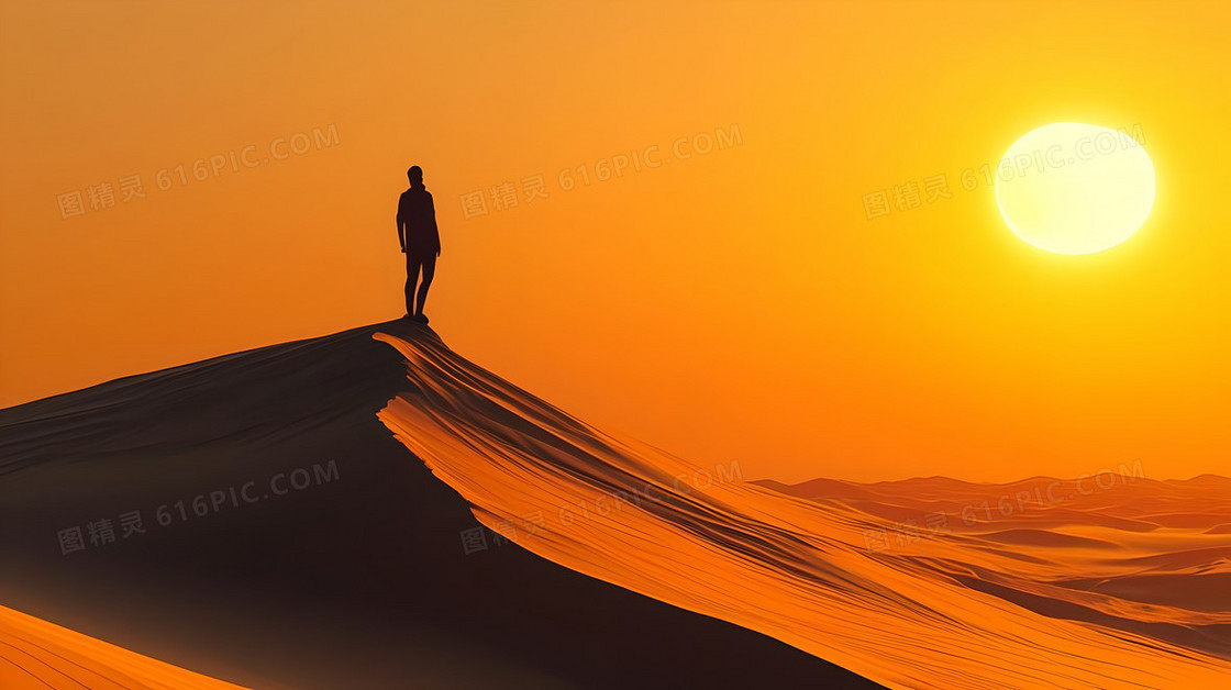 黄昏时分一个剪影的人物站在沙丘的顶端背景