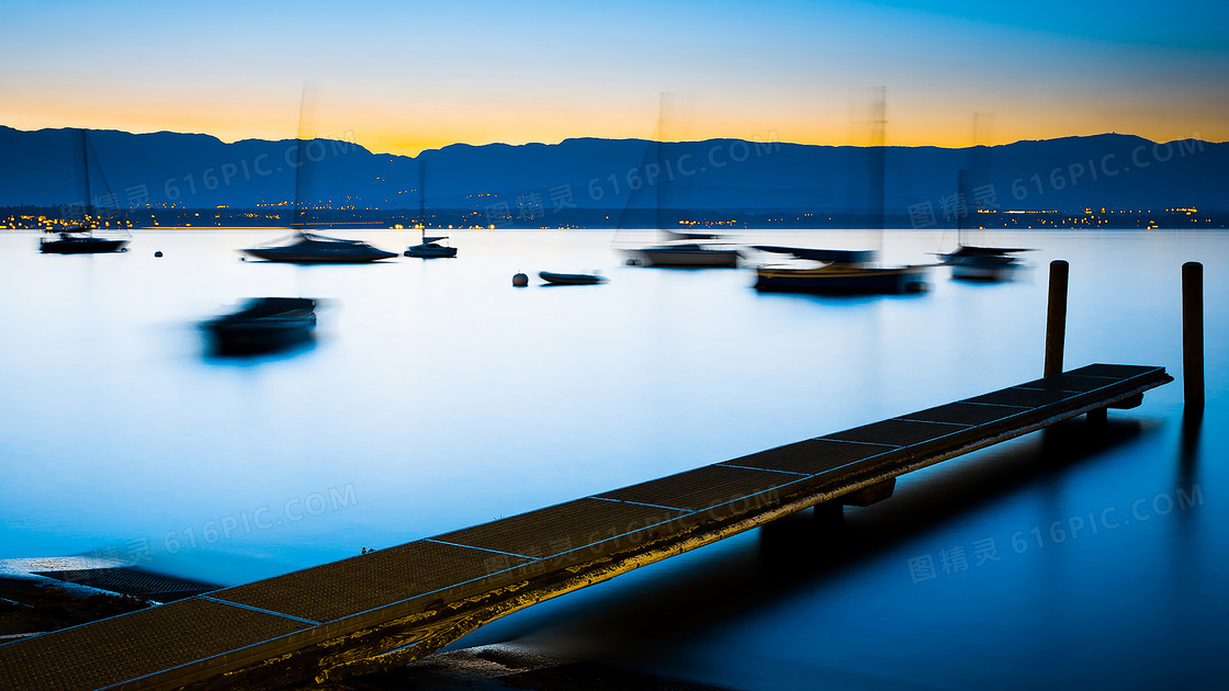 黄昏下的海边码头美景摄影图片