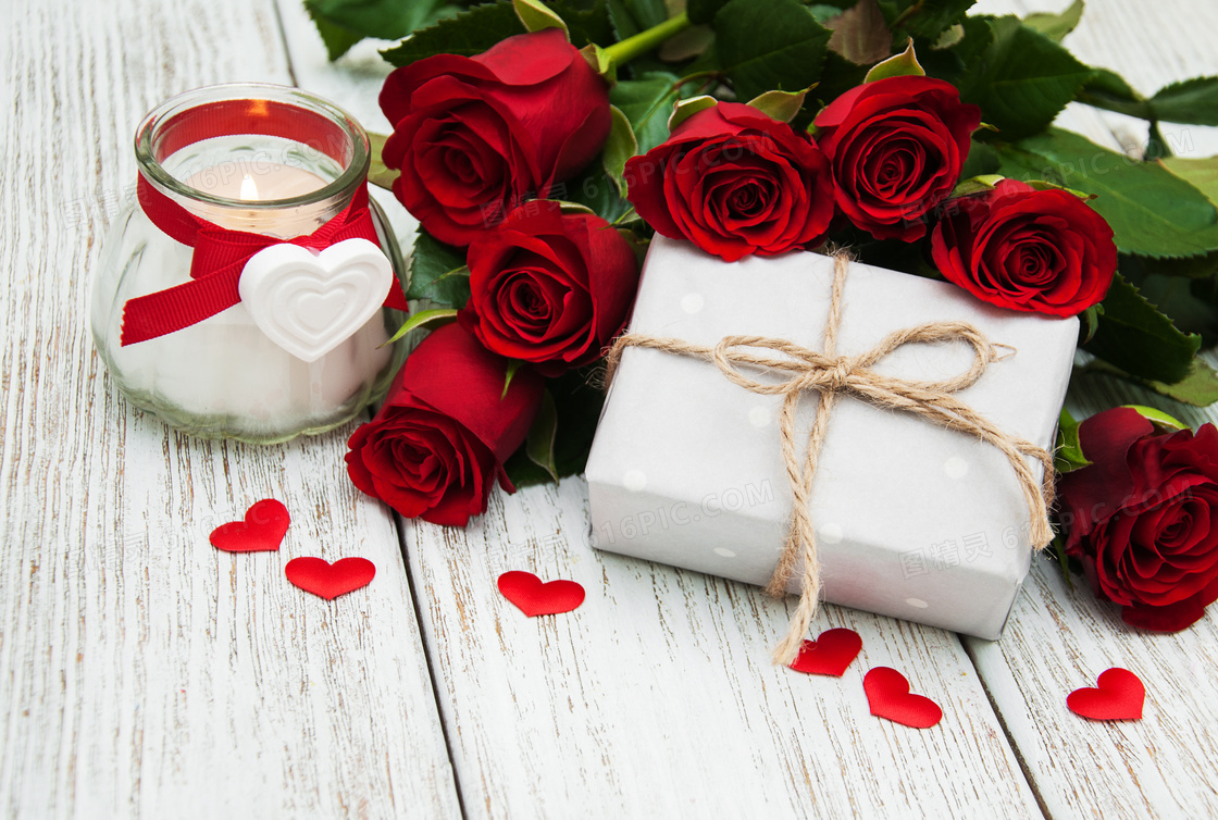 麻绳蜡烛与红色玫瑰花摄影高清图片