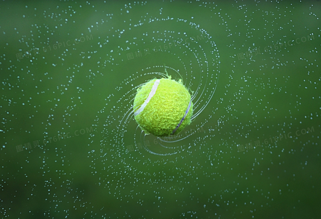 甩出其水分的网球特写摄影高清图片