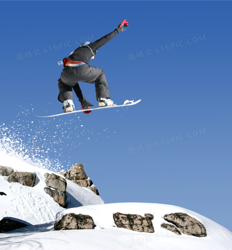 冬天雪上滑板运动人物摄影高清图片