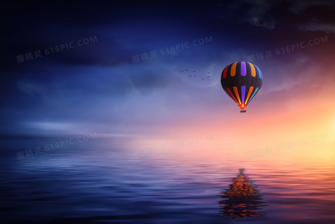 升腾在海面上的热气球摄影高清图片