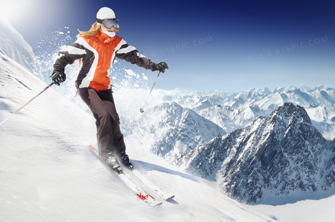 滑雪人物与连绵的雪山摄影高清图片
