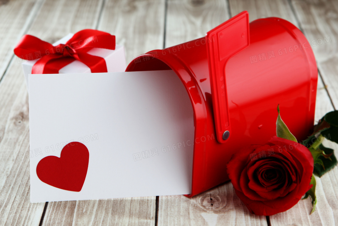礼物盒与红色信箱特写摄影高清图片