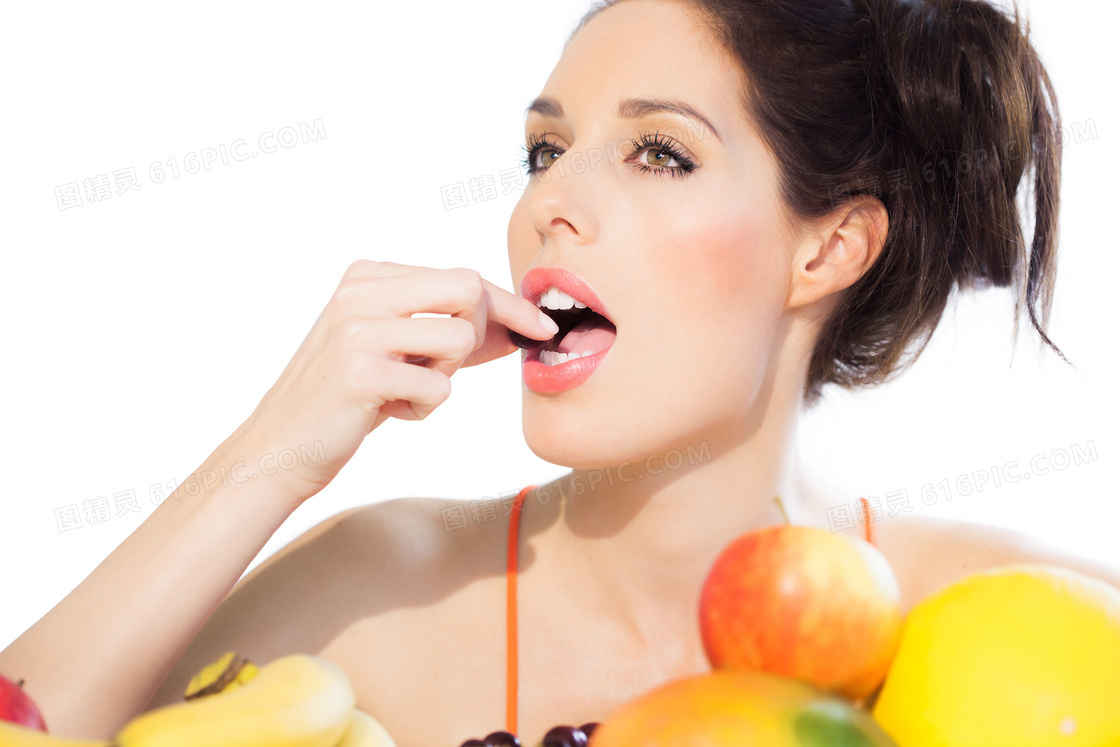水果与在吃东西的美女摄影高清图片