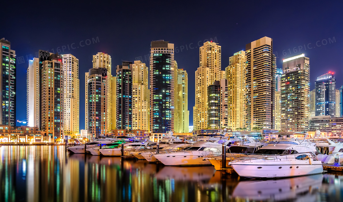 迪拜高楼与码头的船只摄影高清图片