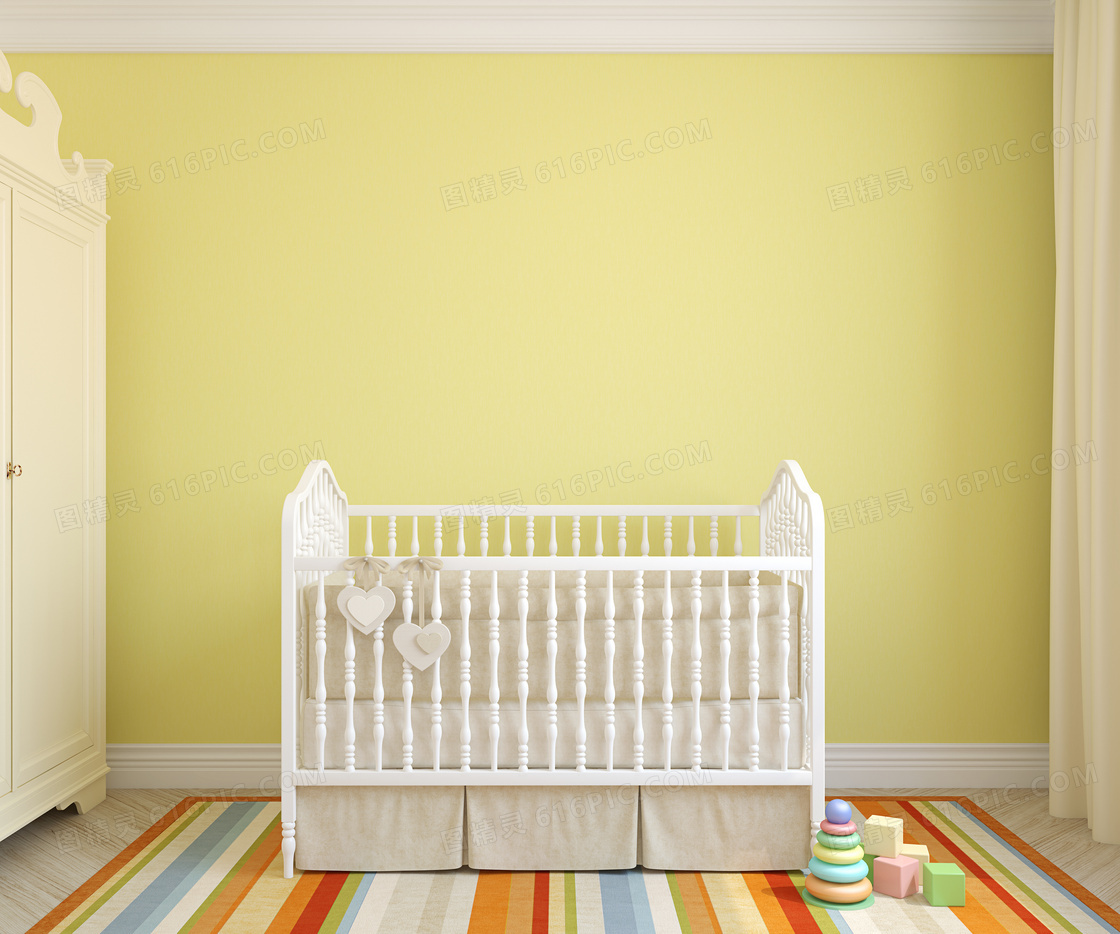 儿童房里摆放的婴儿床摄影高清图片