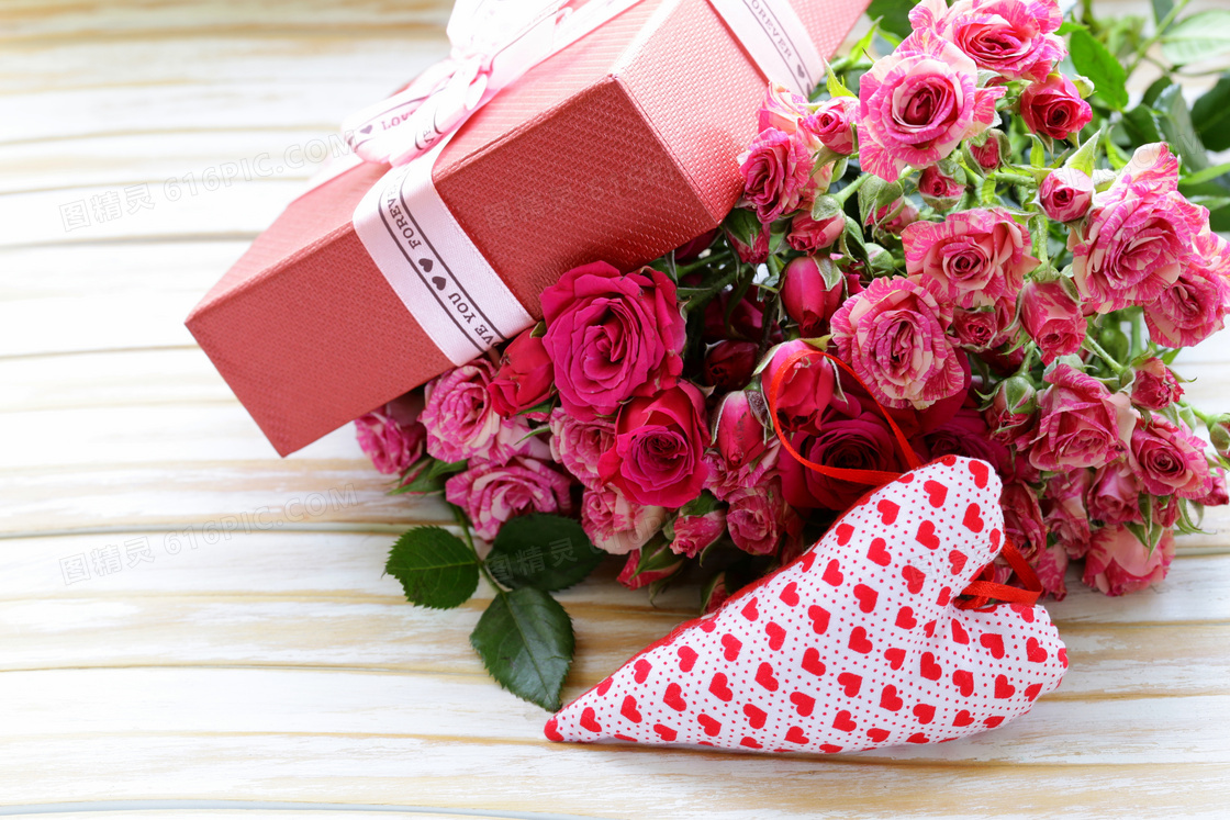 玫瑰花朵与红色礼物盒摄影高清图片