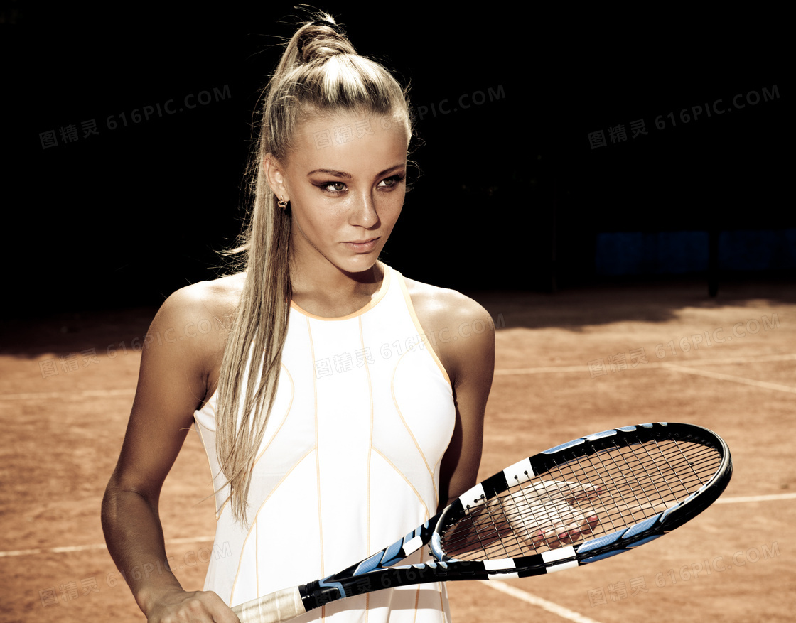 拿球拍的长发网球美女摄影高清图片