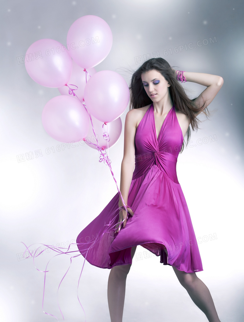 手拿着气球的紫裙美女摄影高清图片