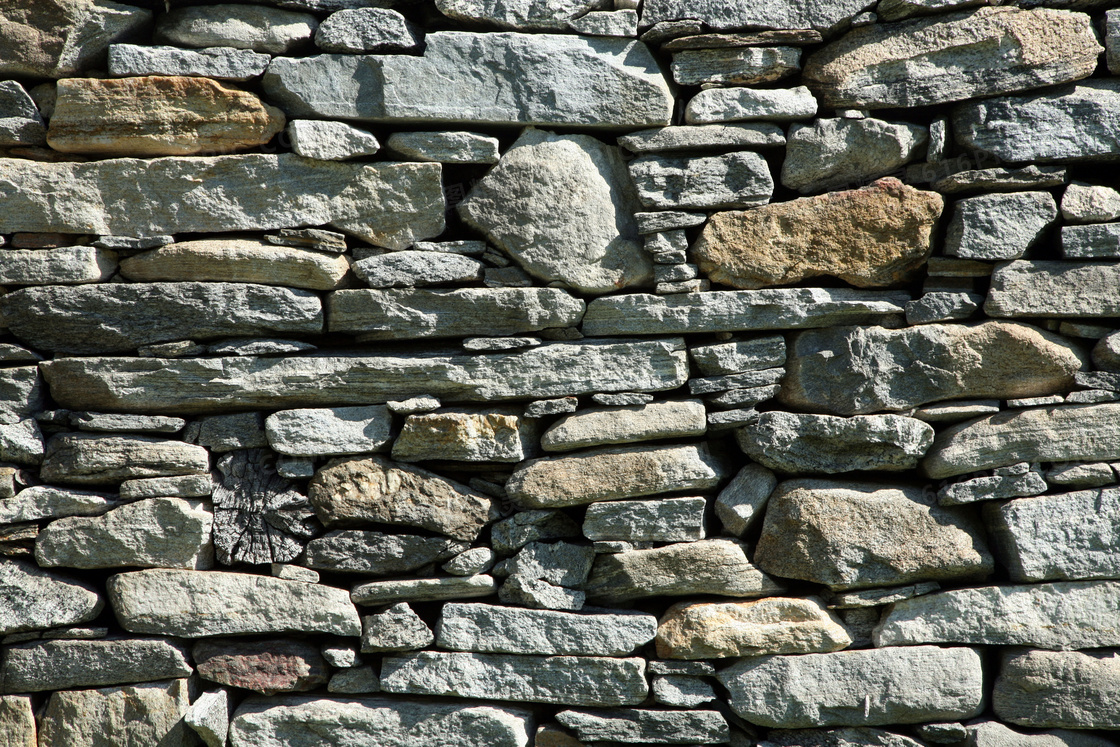 石头石块垒成的墙高清摄影图片